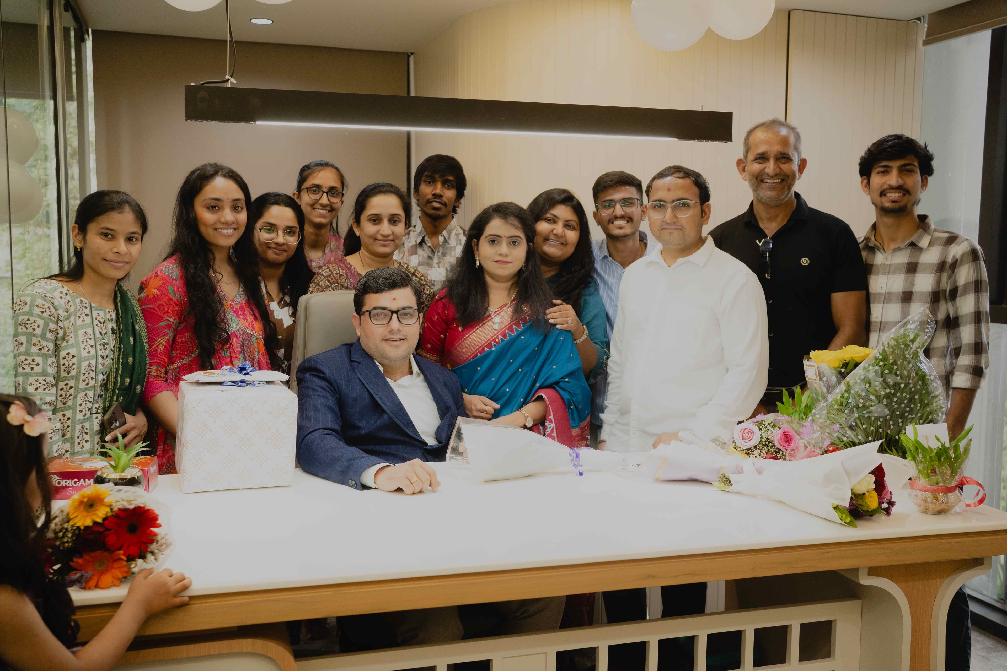 Pujara & Co team group photo